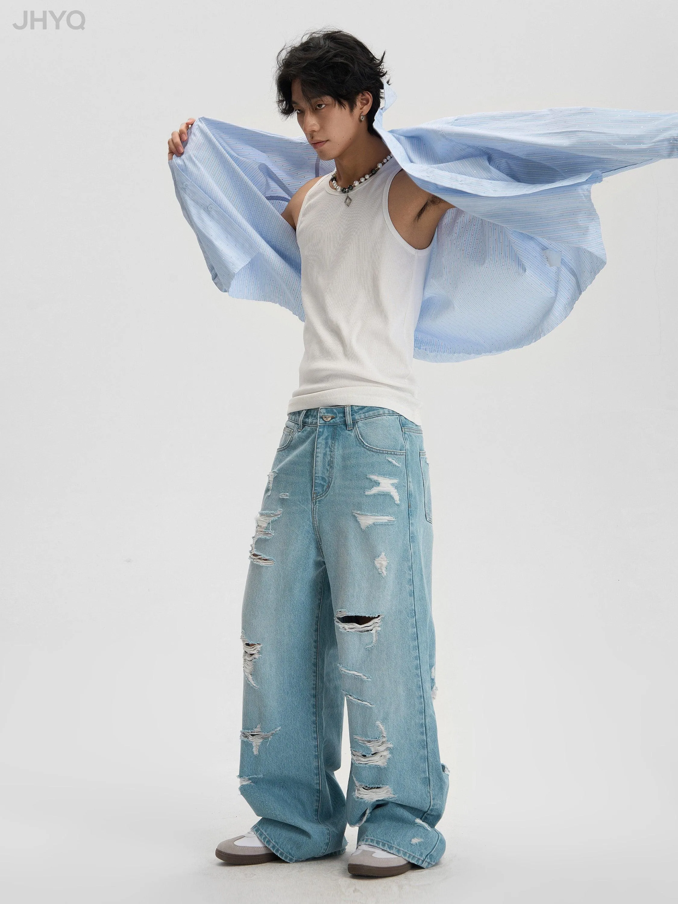 Light Wash Baggy Jeans With Distressed Holes