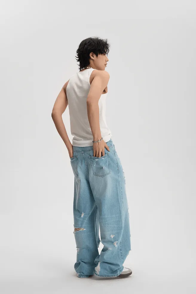 Light Wash Baggy Jeans With Distressed Holes