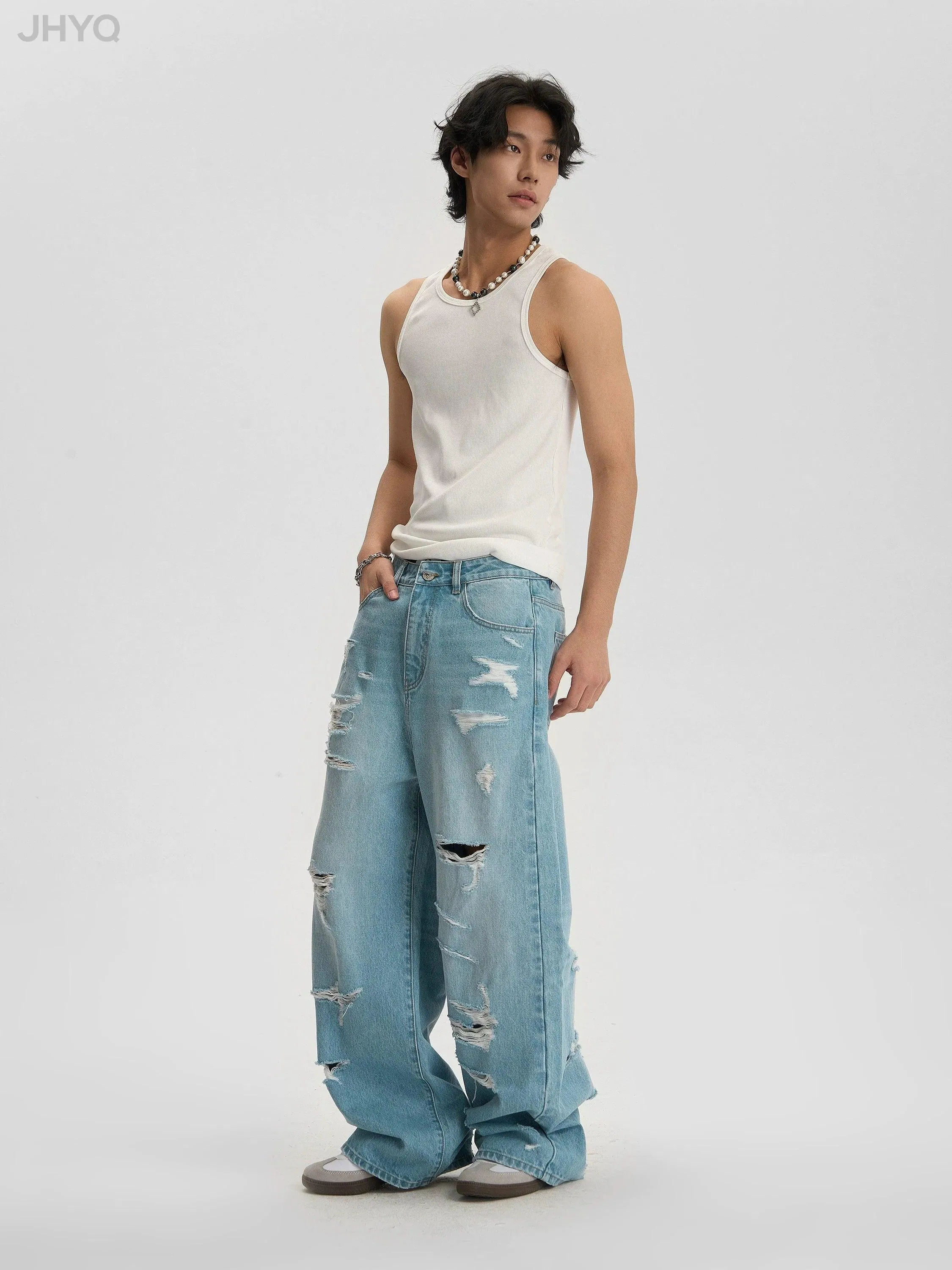 Light Wash Baggy Jeans With Distressed Holes