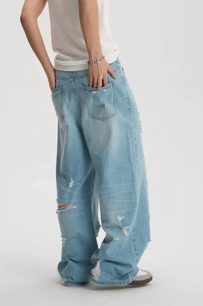Light Wash Baggy Jeans With Distressed Holes