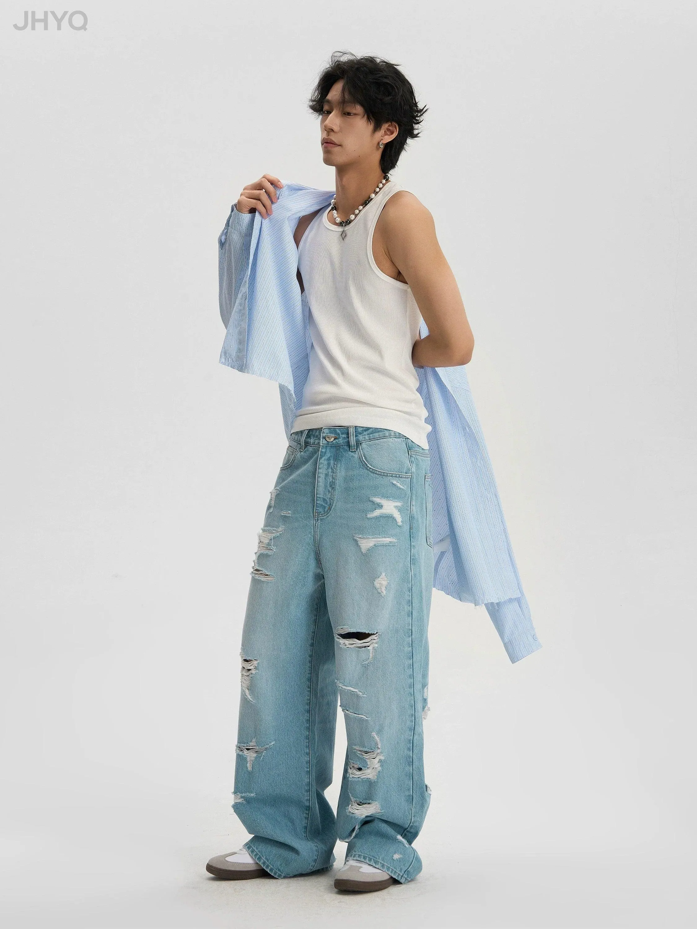 Light Wash Baggy Jeans With Distressed Holes