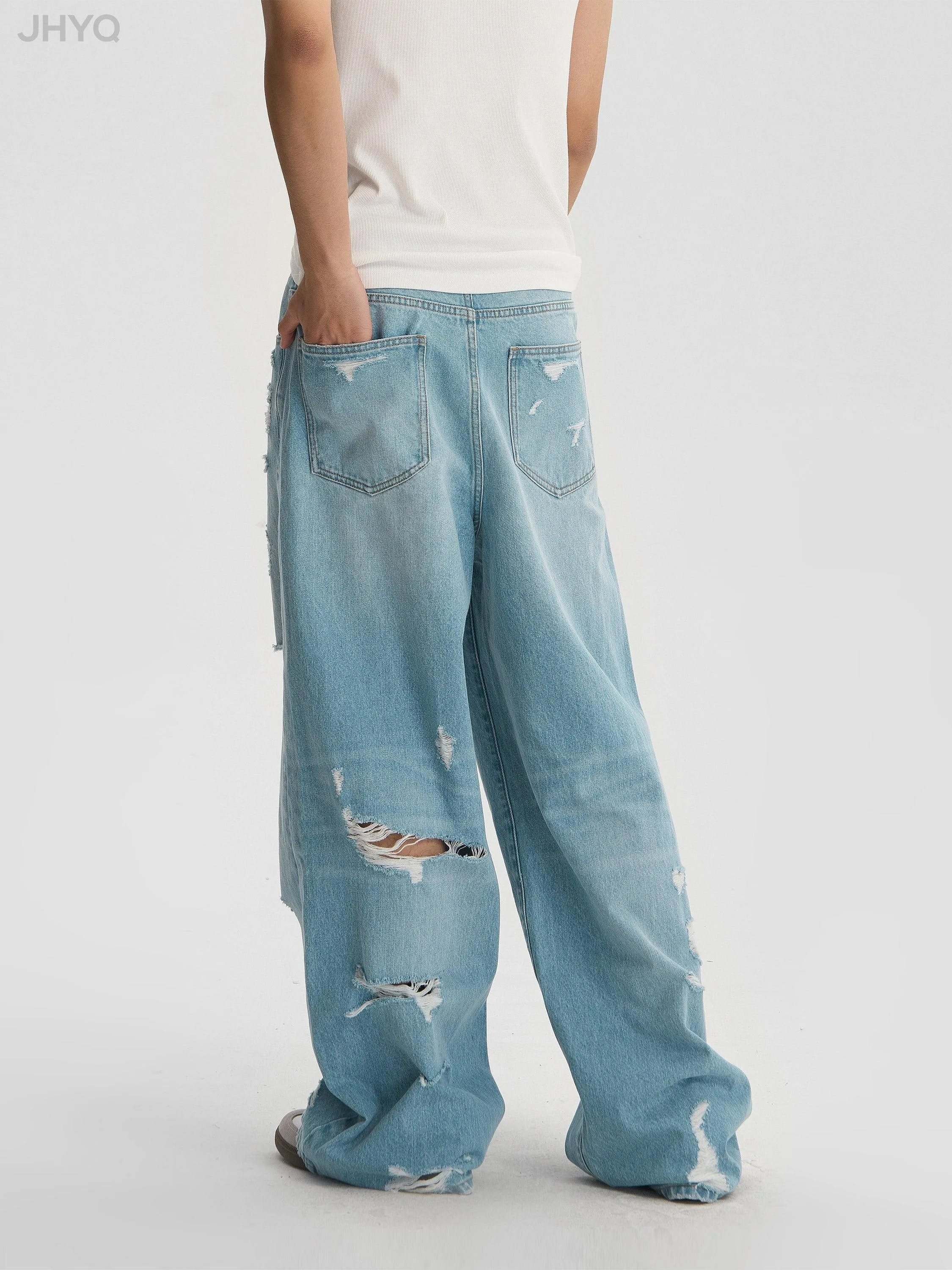 Light Wash Baggy Jeans With Distressed Holes