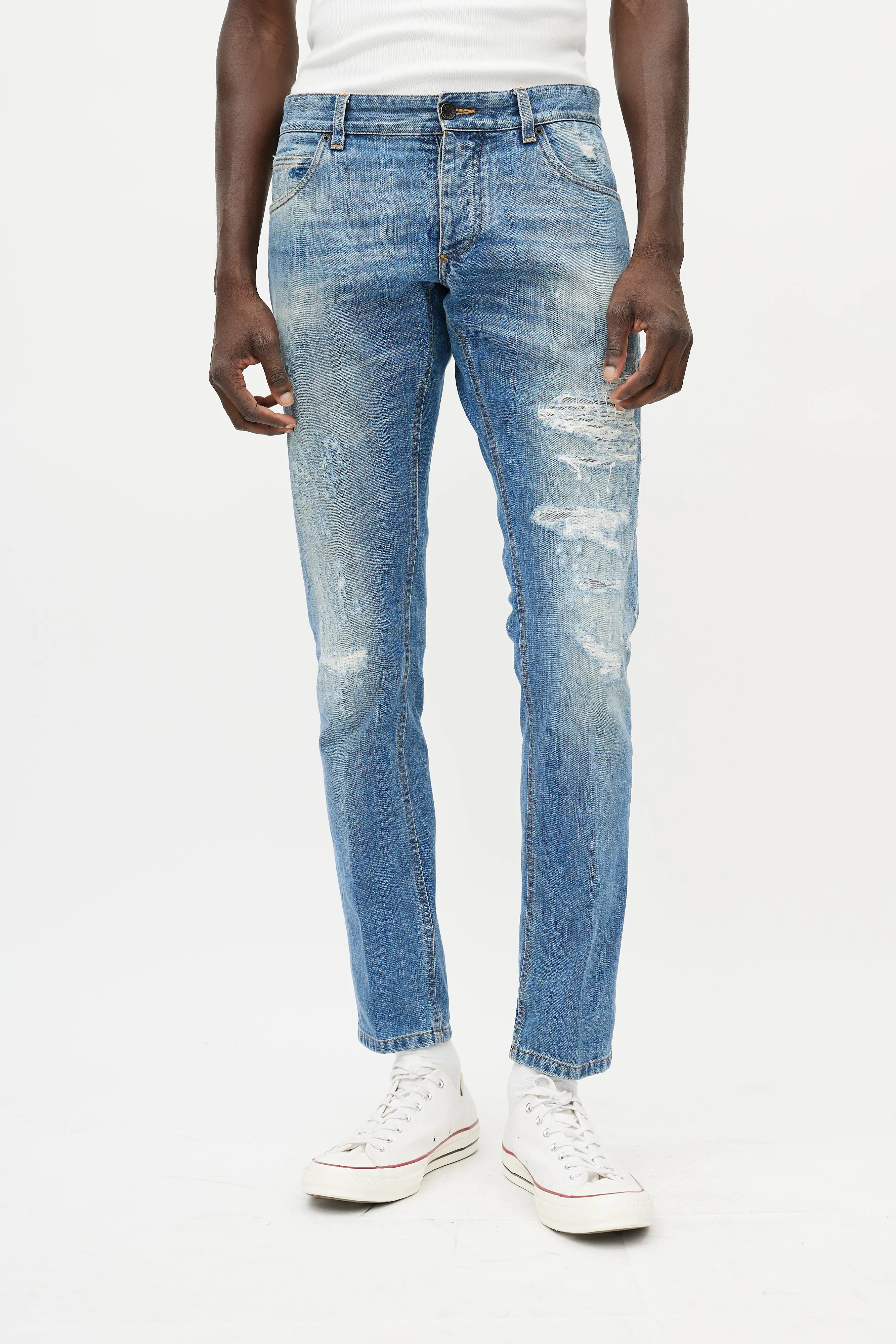 Light Wash Distressed Slim Jeans