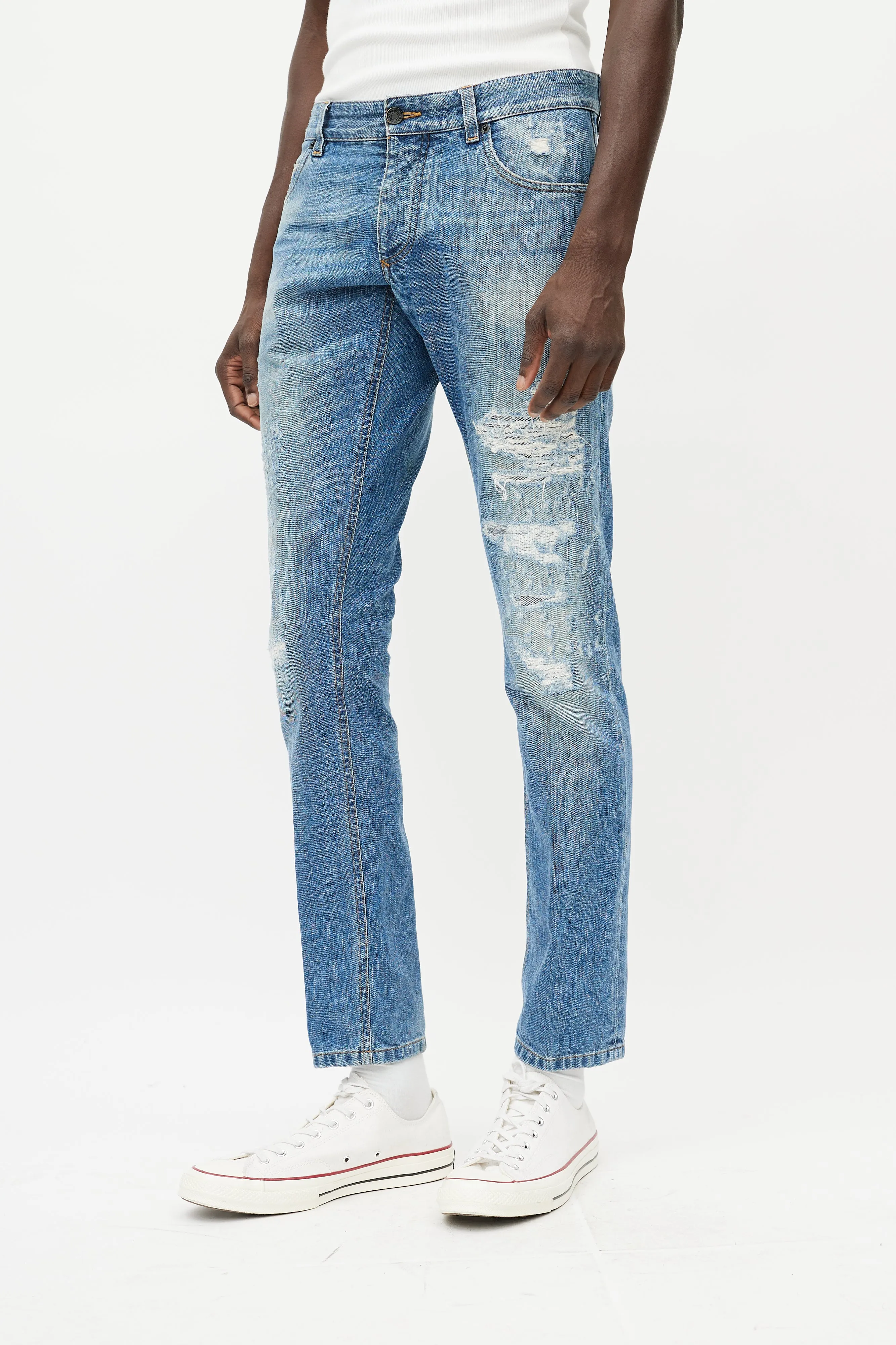 Light Wash Distressed Slim Jeans
