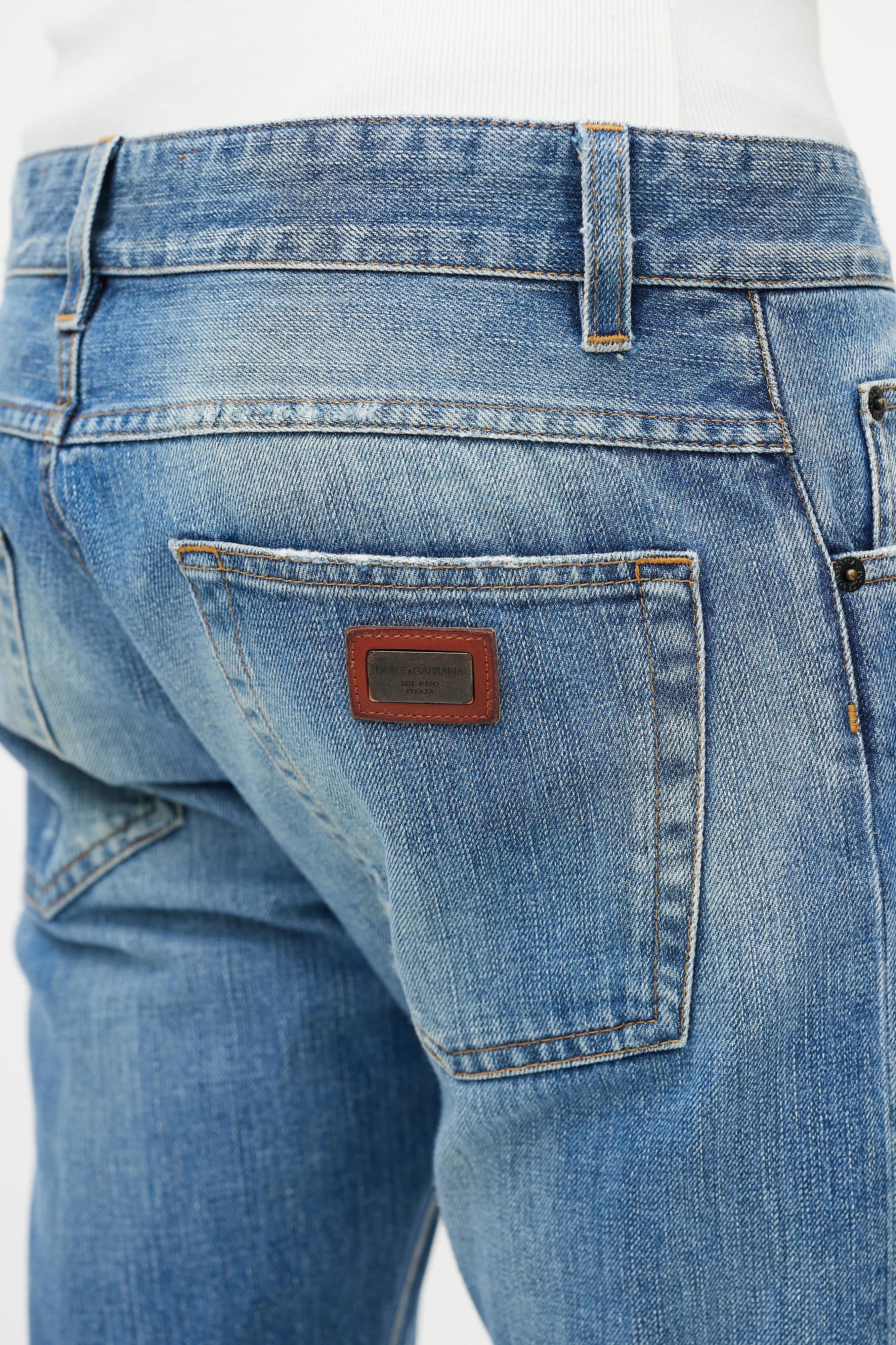 Light Wash Distressed Slim Jeans